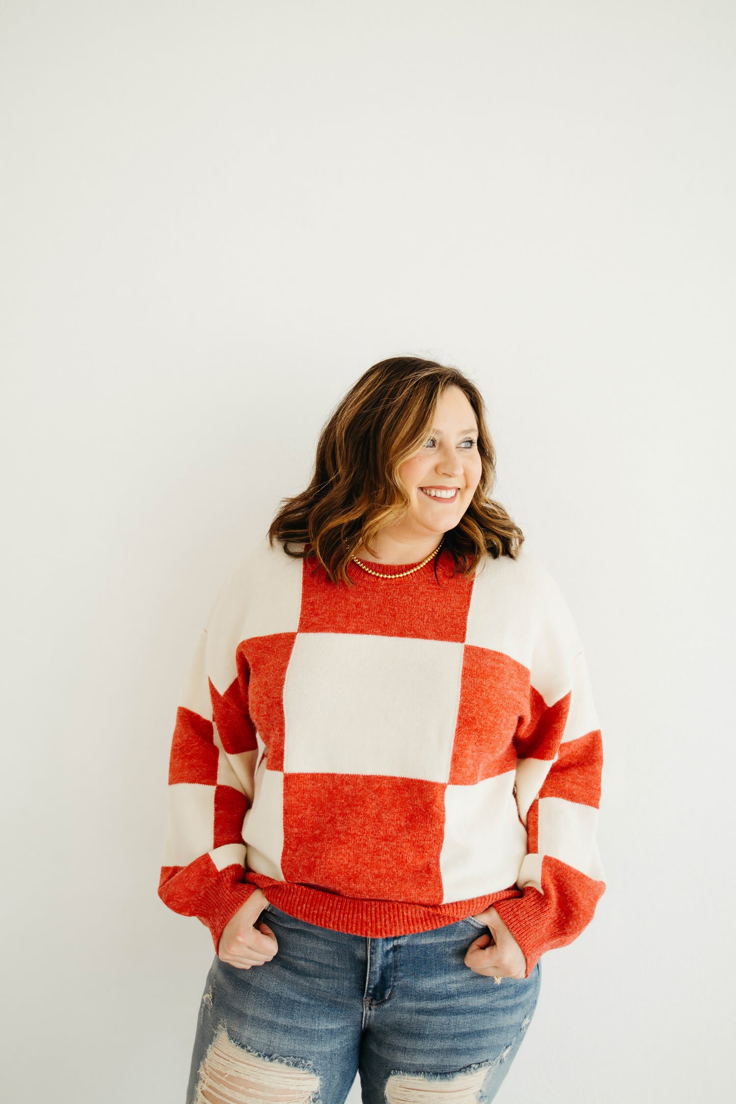 Emily Paige Designs Red Checkered Sweater Deposit