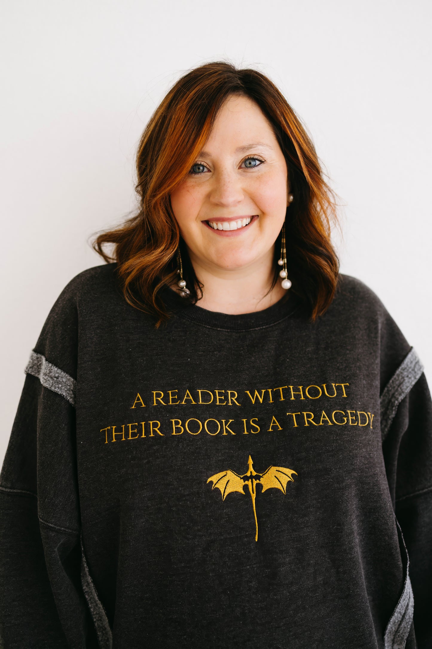 A Reader Without Their Book is a Tragedy Pullover Deposit