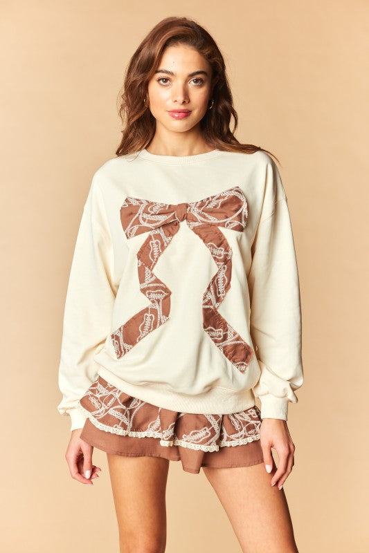 Lace Ribbon Football Embroidered Sweatshirt by Rareraw